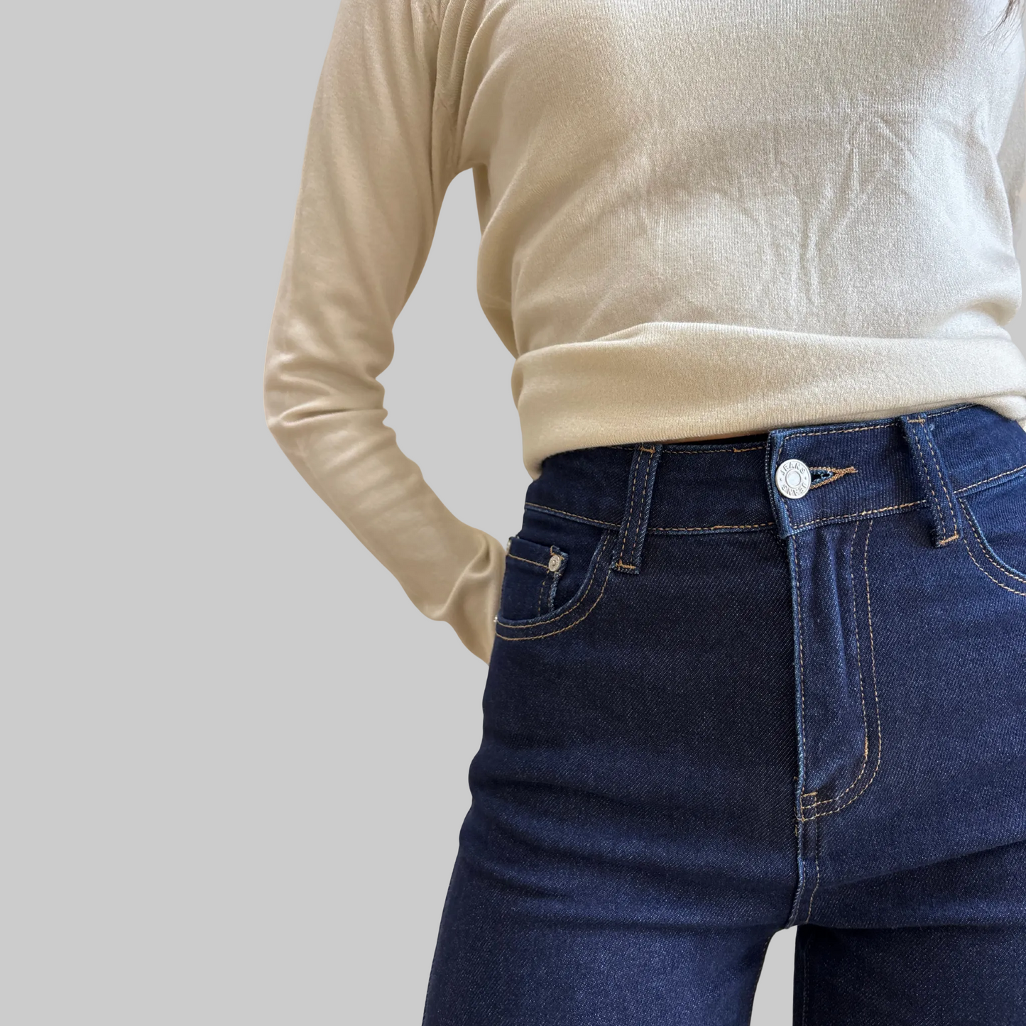 Jeans con piegone