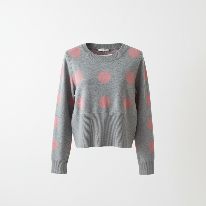 Professional ghost mannequin photo of polka dot sweater