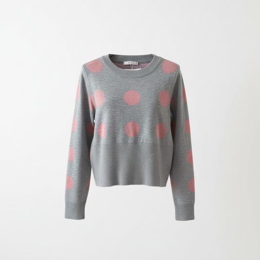 Professional ghost mannequin photo of polka dot sweater