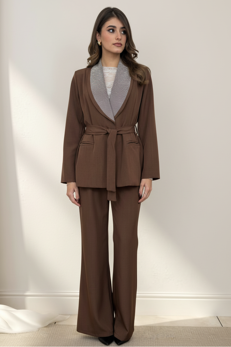 Professional studio photo of brown suit with embellished collar